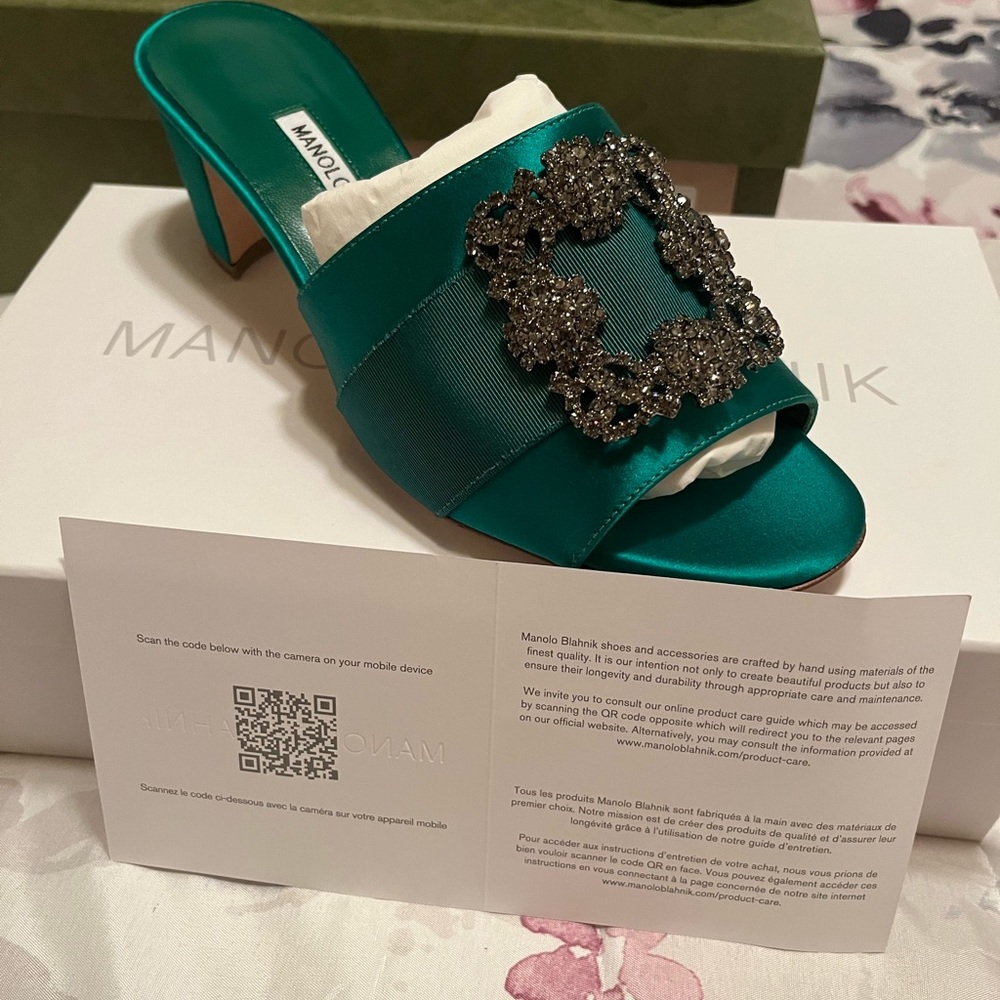 Authentic Manolos, brand NEW never worn. Very cute and comfortable.